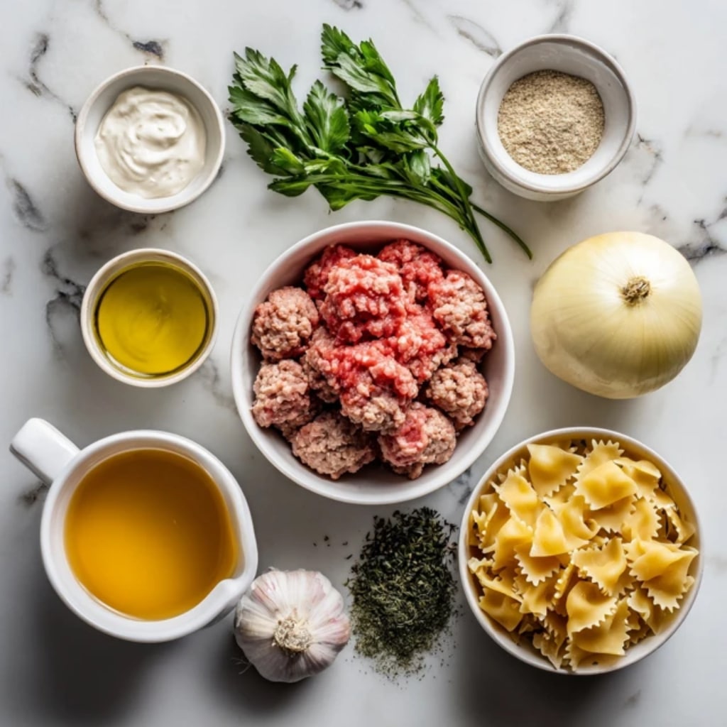 Creamy Italian Meatball Soup: A Cozy, Flavor-Packed Comfort Dish 6 Ingredients for Creamy Italian Meatball Soup arranged on marble surface